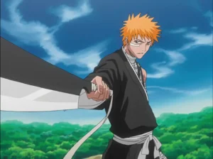 Best Battle Anime of All Time 1 An anime character with spiky orange hair stands confidently in black samurai-style robes, holding an oversized sword in front of a clear blue sky and lush green landscape.