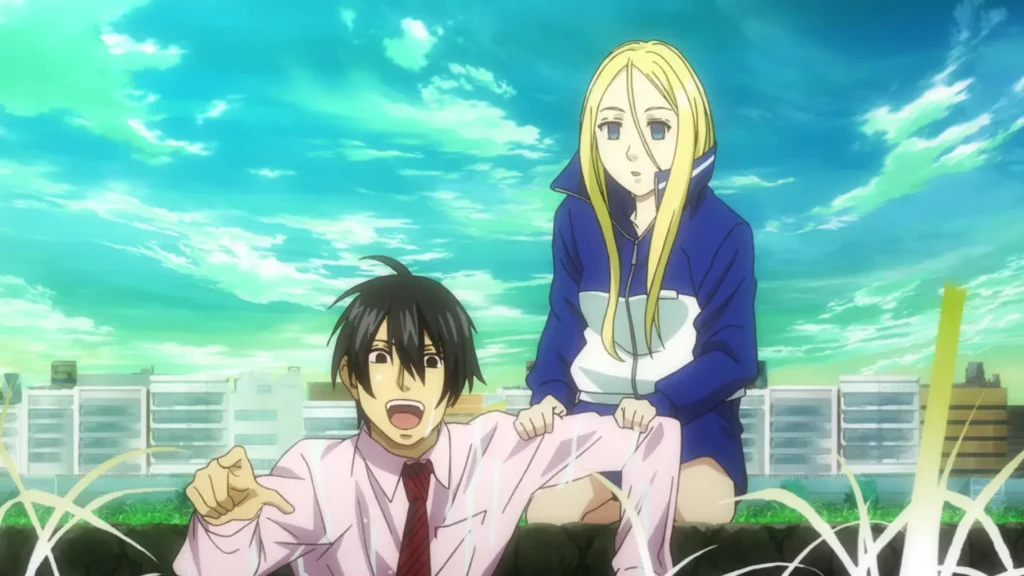 Scene from Arakawa Under the Bridge: On a sunny riverbank with city buildings in the distance and a vividly turquoise sky, a young businessman in a wrinkled pale pink dress shirt and red tie sits on the grass, pointing forward in flustered protest while a tall blonde girl in a loose blue tracksuit jacket kneels behind him, gripping his shoulders as water sprays upward from the river’s edge in exaggerated comedic bursts.