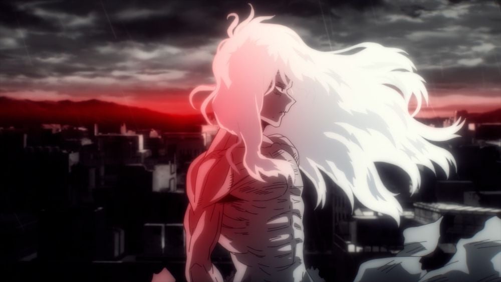 My Hero Academia scene: A muscular figure with billowing, waist‑length white hair stands in profile atop a ruined cityscape. The environment is near‑monochrome—charcoal ruins under a stormy, streaked sky—while a blood‑red band of dusk (or ominous glow) burns at the horizon behind distant mountains, rim‑lighting the character’s hair and scar‑lined torso.