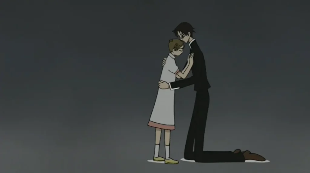xxxHOLiC scene: In a vast dark gray void, a tall, slender boy in a black school uniform kneels and gently embraces a small girl in a simple white dress with pink trim, socks, and yellow slippers. Their bodies lean together, creating a solitary island of warmth in the empty space.